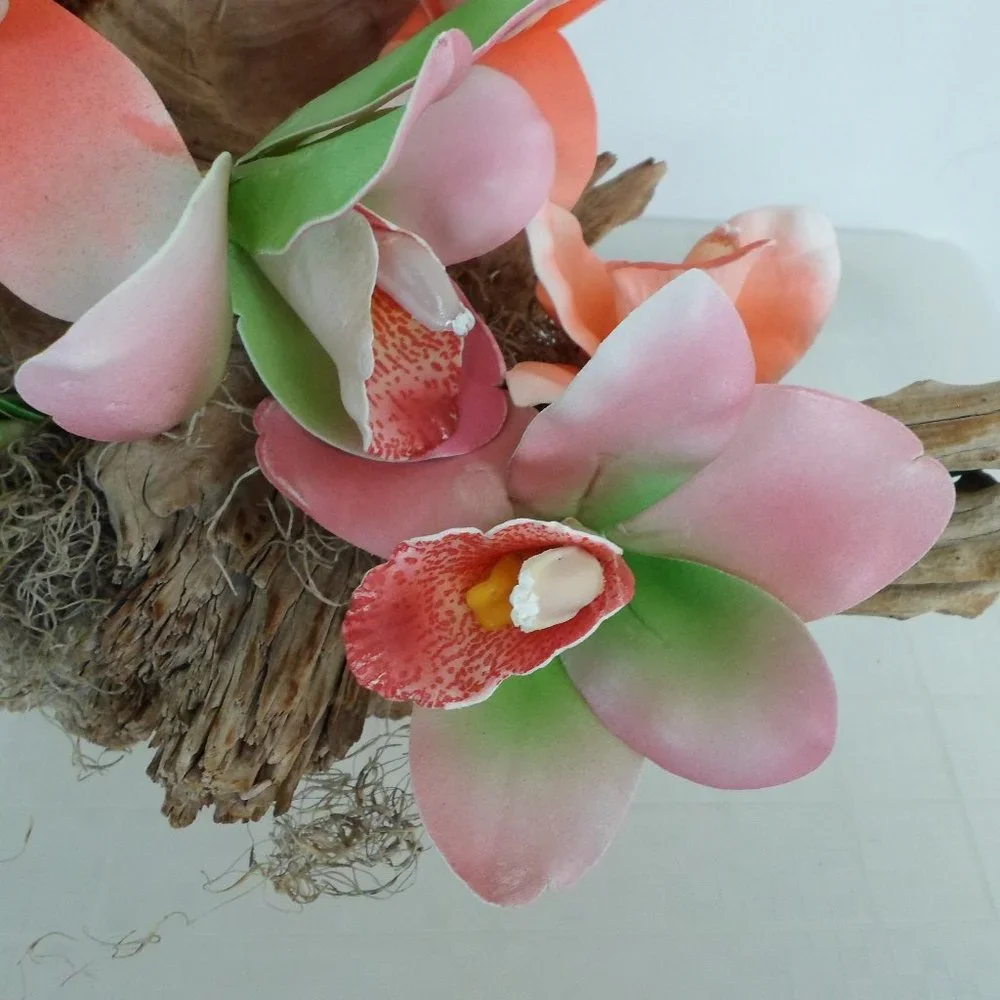 Fabric Orchids on a Tree Trunk Floral Arrangement